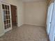 Inviting home office featuring tile flooring, natural light, and a view of an adjacent space at 2565 Bent Green St, Raleigh, NC 27614