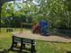 Community playground featuring a slide and bench at 2565 Bent Green St, Raleigh, NC 27614