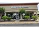 Exterior of Wakefield Tavern featuring outdoor seating, well-maintained landscaping, and ample parking at 2565 Bent Green St, Raleigh, NC 27614