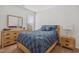 Bedroom featuring a wooden bed frame and matching wooden furniture at 270 Oak Park Blvd, Youngsville, NC 27596