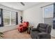 Bonus room featuring neutral carpeting and two comfortable seating chairs at 270 Oak Park Blvd, Youngsville, NC 27596