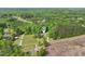 An aerial view of this homes location in a lush and vibrant forest at 2705 Flat Rock Rd, Franklinton, NC 27525
