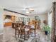 Dining room shows a wood table with seating for six and opens into the kitchen at 2705 Flat Rock Rd, Franklinton, NC 27525