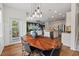 Open dining room view into kitchen and living room perfect for entertaining at 2728 Evanston Ave, Durham, NC 27703