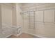Spacious walk-in closet with multiple shelves and ample storage space at 2728 Evanston Ave, Durham, NC 27703