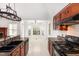 View of kitchen showing granite counters, lots of cabinet space, and eat-in breakfast nook at 300 Ravenstone Dr, Cary, NC 27518
