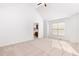 Main bedroom features vaulted ceiling, neutral carpet, and adjoining bathroom at 300 Ravenstone Dr, Cary, NC 27518