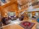 Spacious living room with vaulted wood ceilings, a ceiling fan, and a cozy seating area at 3009 Pleasant Hill Church Rd, Siler City, NC 27344