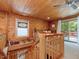 Loft space showcasing wood ceiling and glass doors leading to a balcony at 3009 Pleasant Hill Church Rd, Siler City, NC 27344