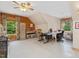 Spacious office area with custom drapes, wood paneling and functional furniture arrangement at 3009 Pleasant Hill Church Rd, Siler City, NC 27344