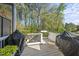 Spacious back deck with grill offers great views and space for outdoor relaxation and entertainment at 3138 Curling Creek Dr, Apex, NC 27502