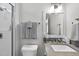 Clean bathroom features white subway tiles in shower, a modern sink, and neutral decor at 3138 Curling Creek Dr, Apex, NC 27502