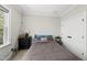 Bright bedroom boasts natural light, closet, and neutral decor for a relaxing retreat at 3138 Curling Creek Dr, Apex, NC 27502