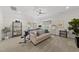 Versatile bonus room featuring a desk, sofa, and neutral decor with natural light at 3138 Curling Creek Dr, Apex, NC 27502