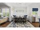 Charming dining room featuring a large table with seating, and built-in bench at 3138 Curling Creek Dr, Apex, NC 27502