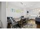 Charming dining room featuring a large table with seating, and built-in bench at 3138 Curling Creek Dr, Apex, NC 27502