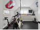 Home gym featuring workout equipment and sports decor at 3138 Curling Creek Dr, Apex, NC 27502