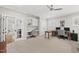 A spacious home office offers dual workspaces and natural light at 3138 Curling Creek Dr, Apex, NC 27502