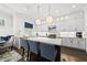 Spacious kitchen with a large island, stainless steel appliances, and ample cabinet space at 3138 Curling Creek Dr, Apex, NC 27502