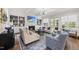Bright living room with fireplace, built-ins, and comfortable seating arrangement at 3138 Curling Creek Dr, Apex, NC 27502