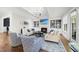 Bright living room with a fireplace, stylish furniture, and built-in shelving at 3138 Curling Creek Dr, Apex, NC 27502