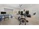 Spacious living room with neutral tones, carpet, entertainment center, a desk, and lots of space for fun at 3138 Curling Creek Dr, Apex, NC 27502