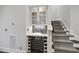 Basement wine cellar with temperature-controlled storage and glass display cabinets at 3138 Curling Creek Dr, Apex, NC 27502