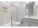 Modern bathroom with glass-enclosed shower and white vanity at 3529 Bailey Lake Dr, Fuquay Varina, NC 27526