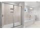 Bathroom showcases a walk-in shower and soaking tub with neutral color palette at 3529 Bailey Lake Dr, Fuquay Varina, NC 27526
