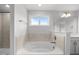 Bathroom tub complete with tile surround, window view and hardware at 3529 Bailey Lake Dr, Fuquay Varina, NC 27526