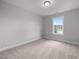 Bedroom with neutral walls and carpet, and lots of natural light at 3529 Bailey Lake Dr, Fuquay Varina, NC 27526
