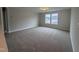 Spacious bedroom featuring neutral paint, plush carpet, and natural light at 3529 Bailey Lake Dr, Fuquay Varina, NC 27526