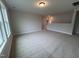 Spacious bedroom featuring neutral paint, plush carpet, and natural light at 3529 Bailey Lake Dr, Fuquay Varina, NC 27526