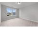 Bright bedroom with plush carpeting, large windows, and ample natural light at 3529 Bailey Lake Dr, Fuquay Varina, NC 27526