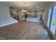 Open-concept kitchen featuring stainless steel appliances, granite countertops, and an island with bar seating at 3529 Bailey Lake Dr, Fuquay Varina, NC 27526