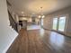Open-concept kitchen featuring stainless steel appliances, granite countertops, and an island with bar seating at 3529 Bailey Lake Dr, Fuquay Varina, NC 27526