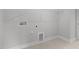 Utility room or laundry area with hookups and tile flooring at 3529 Bailey Lake Dr, Fuquay Varina, NC 27526