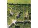 Aerial view of a home and its large wooded lot at 3607 Springhollow Ct, Efland, NC 27243