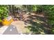 Spacious backyard featuring a shed and bordered by woods, offering privacy and storage solutions at 3607 Springhollow Ct, Efland, NC 27243