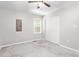 Bedroom with a ceiling fan, natural light and an electrical panel at 3607 Springhollow Ct, Efland, NC 27243