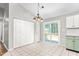 Bright dining area featuring tile flooring and access to the deck at 3607 Springhollow Ct, Efland, NC 27243