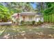 Charming single-story home with a welcoming front porch and well-maintained landscaping at 3607 Springhollow Ct, Efland, NC 27243