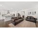Spacious living room with a fireplace and comfortable seating area at 361 Natsam Woods Way, Wake Forest, NC 27587