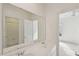 Bathroom featuring a double sink vanity and a large mirror with access to the shower and bedroom at 403 Brookgreen Dr, Chapel Hill, NC 27516