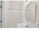 Clean bathroom featuring a shower with glass doors, large mirror, and sink at 403 Brookgreen Dr, Chapel Hill, NC 27516