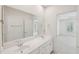 Main bathroom with double sink vanity and large mirror at 403 Brookgreen Dr, Chapel Hill, NC 27516