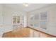 Bright dining room boasts hardwood floors, ample windows, and an easy transition to the outdoor deck at 403 Brookgreen Dr, Chapel Hill, NC 27516