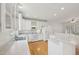 Eat-in kitchen features white cabinetry, an island, and stainless steel appliances at 403 Brookgreen Dr, Chapel Hill, NC 27516