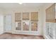 Sunroom with tile flooring, large windows, and outdoor views at 403 Brookgreen Dr, Chapel Hill, NC 27516