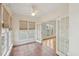 Cozy sunroom with tile floors and lots of natural light at 403 Brookgreen Dr, Chapel Hill, NC 27516